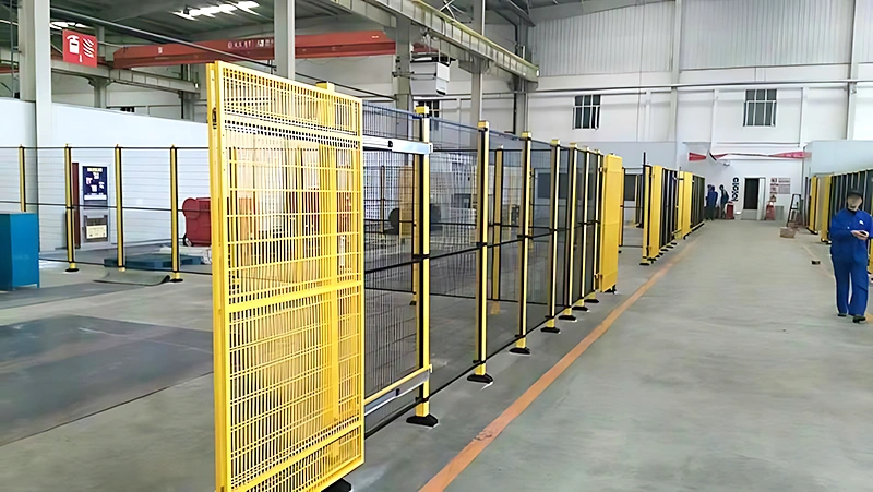 instalação de cercado de segurança em fábrica de manufatura automotiva