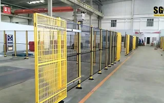 MDFence modular safety fence for high-end manufacturing with open sliding door and clean cold-work installation layout