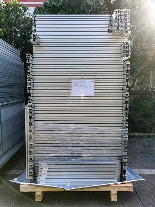 Aluminum safety fence extrusion components palletized for industrial guarding projects