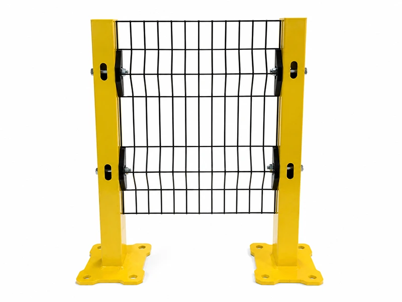 Industrial safety fence panel with welded steel mesh, yellow posts, and bolt-down base plates.
