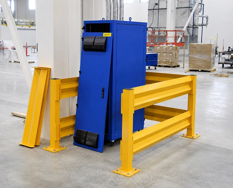 Corrugated guard rail with a lift-out panel protecting an industrial equipment cabinet